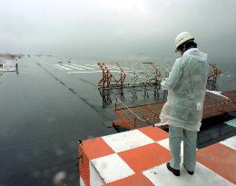 Giant platform for floating airport shown off Yokosuka